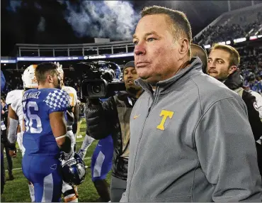  ?? DAVID STEPHENSON / AP ?? Tennessee coach Butch Jones is mired in a four-game losing streak and is facing constant questions about job security. “I understand everybody being upset, and if Iwas a fan I’d be upset too,” Jones said.