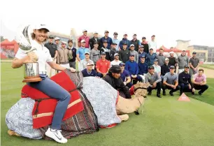  ?? Supplied photo ?? Defending Champion Tommy Fleetwood holds the trophy during a photo session. —