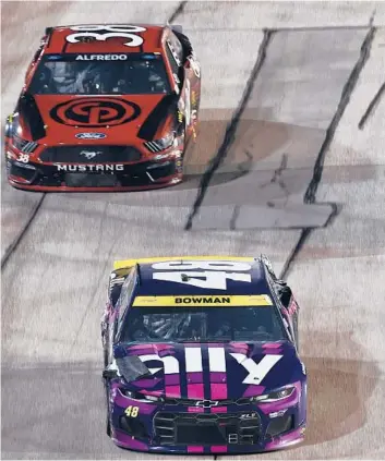  ?? JARED C. TILTON/GETTY ?? Alex Bowman, front, will open Saturday’s race at Bristol Motor Speedway below the playoff cutline.