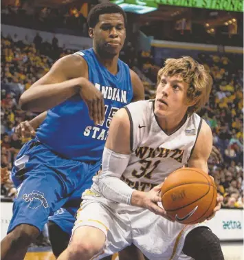  ?? SCOTT KANE, USA TODAY SPORTS ?? Wichita State, including guard Ron Baker, looks to become the eighth unbeaten NCAA men’s basketball tournament champ. The last unbeaten men’s champion was Indiana (32-0) in 1976.