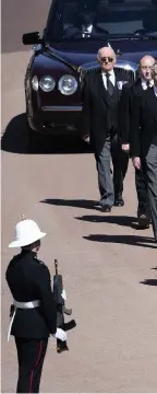  ??  ?? The Royal Family follow Prince Philip, Duke of Edinburgh’s coffin during the ceremonial procession at Windsor Castle during his funeral yesterday