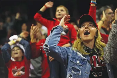  ?? WADE VANDERVORT ?? UNLV fans cheer as their team defeats the Colorado State Rams in 2019 at the Thomas & Mack Center. The next time fans are allowed back into the Thomas & Mack, UNLV will be without its Hey Reb! mascot, which the university is retiring.