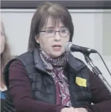  ?? CP ?? Ginette Chartre speaks while wearing a yellow badge at Monday’s council meeting in the Montreal borough of Outremont.