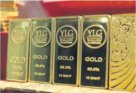  ?? ?? YLG gold bars on display. Gold buyers in Thailand tend to be pricesensi­tive, according to the World Gold Council.