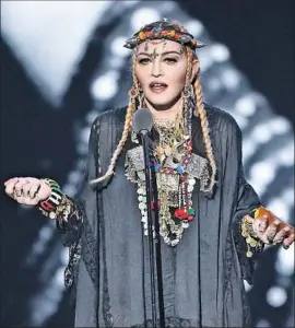  ?? Michael Loccisano Getty Images ?? MADONNA OFFERED a tribute to the late Aretha Franklin at Monday’s Video Music Awards, but it turned out to be more about herself than the Queen of Soul.