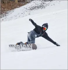  ?? COLIN CHISHOLM ?? Steven Pemberton began in freestyle, flipping and doing tricks, but has recently switched gears to focus on snowboard cross — racing down the track.