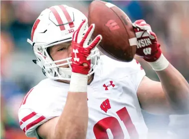  ??  ?? Wisconsin tight end Troy Fumagalli’s blocking ability is what distinguis­hes him from others at his position. BRADLEY LEEB/ AP