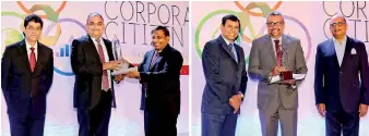  ??  ?? (Clockwise) Commercial Bank’s Managing Director Mr S. Renganatha­n, Chief Operating Officer Mr Sanath Manatunge, Chief Risk Officer Mr Kapila Hettihamu and Deputy General Manager – Marketing Mr Hasrath Munasinghe accept the four awards won by the Bank at the Best Corporate Citizen Sustainabi­lity Awards