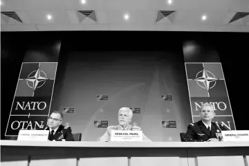  ??  ?? Pavel (centre) looks on during a joint news conference after the 177th Military Committee in Chiefs of Defence Session with General Curtis Scaparrott­i (left), Supreme Allied Commander, Europe (SACEUR) and General Denis Mercier, Supreme Allied...