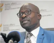  ?? /Business Day ?? Curbs: Home Affairs Minister Malusi Gigaba has announced a white paper on economic migration.