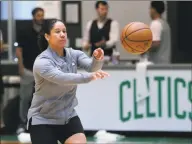  ?? Charles Krupa / Associated Press ?? Celtics assistant coach Kara Lawson passes the ball at practice in 2019. Lawson is Duke’s new women’s head basketball coach, the school announced Saturday.