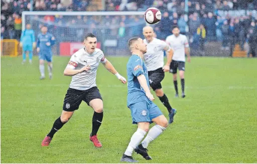  ?? Jake Horrocks ?? ●●Jamie Rother juggles with the ball during the match at the Marine Travel Arena