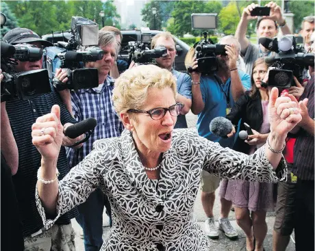  ?? THE CANADIAN PRESS FILES ?? Premier Kathleen Wynne says voters must choose between the caring Liberals and cost-cutting Progressiv­e Conservati­ves.