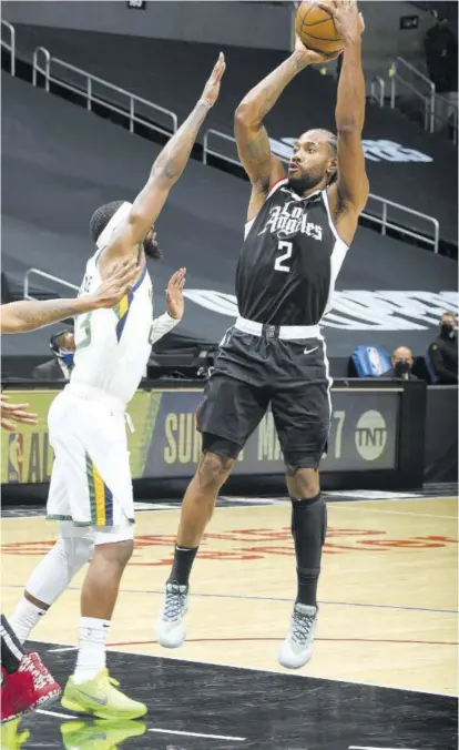  ?? (Photo: AFP) ?? Kawhi Leonard (#2) of the LA Clippers shoots the ball during the game against Utah Jazz at STAPLES Center in Los Angeles, California, on Friday.