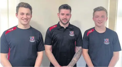  ??  ?? Mike Booth, Andy Fisher and Dan Thomas display the new Porthcawl Town Athletic training tops and polos