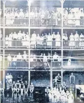  ??  ?? Bathers enjoy the mineral-rich waters of White Sulphur Springs in this photo dated June 1920 in White Springs.