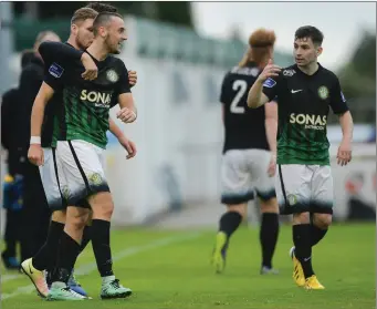  ??  ?? Dylan Connolly of Bray Wanderers celebrates with team-mates after scoring his side’s first goal.