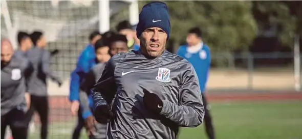  ?? AFP PIC ?? Carlos Tevez has played only 11 times for Shanghai Shenhua this year.
