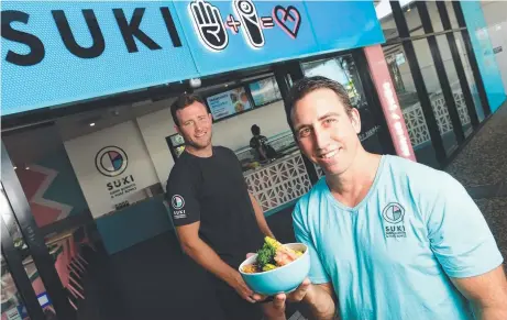  ?? HEALTHY EATS: Cowboys player Gavin Cooper ( left) and Shaun McCarthy, co- owners of Suki. Picture: SCOTT RADFORD- CHISHOLM ??