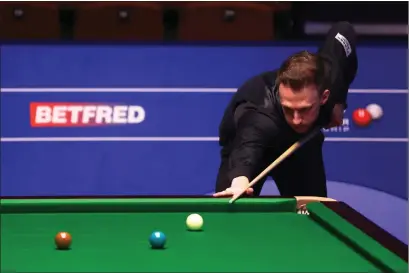  ??  ?? Judd Trump in action at the World Championsh­ips