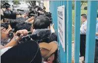  ?? AP PHOTO ?? North Korean Embassy counselor Kim Yu Song reads out a press release to reporters at the gate of the embassy in Kuala Lumpur, Malaysia, Friday.