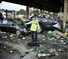  ??  ?? Le chauffeur du camion roumain, qui a pulvérisé la barrière de péage de l’A à Nice Ouest, a été placé en détention provisoire (Photo Frantz Bouton)