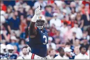  ?? AP/BUTCH DILL ?? Auburn defensive end Marlon Davidson (3) reacts after a stop against Alabama during the first half Saturday in Auburn, Ala.