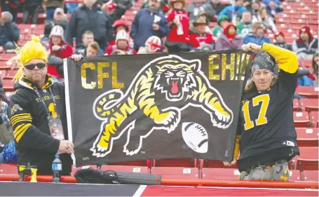  ?? JIM WELLS/ FILES ?? Hamilton fans were on hand at Calgary's Mcmahon Stadium to support their Ticats at the 107th Grey Cup on Nov. 24, 2019. With the 2020 season lost to the COVID-19 pandemic, Dan Barnes writes, CFL fans, as much as the players, want a commitment from the league to return in 2021.