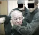  ?? (Reuters) ?? A STILL IMAGE shows Skripal being detained by intelligen­ce officers in an unknown location.