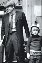  ??  ?? Tough but tender: Boris, aged five, with his father Stanley