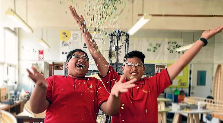  ?? SHANI WILLIAMS/STUFF ?? Students Sam Tongai, 13, and Fifita Fainga’a, 12, say they love turning plastic into something useful.