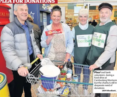  ?? 280416food­bank_1 ?? Plea Food bank volunteers during a food drive at Cambuslang Morrisons but the charity is still in desperate need of donations