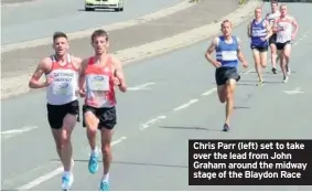  ??  ?? Chris Parr (left) set to take over the lead from John Graham around the midway stage of the Blaydon Race