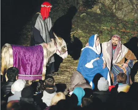  ??  ?? The First Christmas Nativity Pageant celebratin­g the story of the birth of Jesus is presented by local members of The Church of Jesus Christ of Latter-Day Saints and friends at Topaz Park.