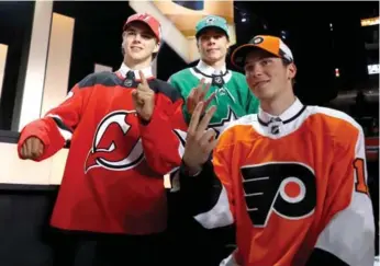  ?? BRUCE BENNETT/GETTY IMAGES ?? Nico Hischier to the Devils, Miro Heiskanen to the Stars, Nolan Patrick to the Flyers … the top three picks in the NHL draft team up after the first-round dust had settled in Chicago on Friday night.