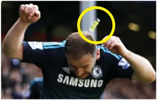  ?? REUTERS ?? Missile: a lighter (circled) thrown from the crowd hits Ivanovic’s head