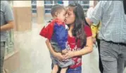  ?? AFP ?? A woman reunited with her son in El Paso, Texas.