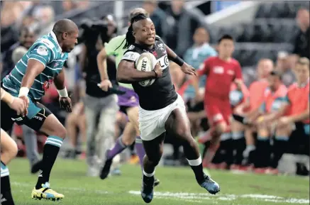  ?? PICTURE: HOWARD CLELAND ?? TRY TIME: Sharks wing Sbu Nkosi had a busy night against the Griquas, scoring two tries during their Currie Cup match at Kings Park last night.