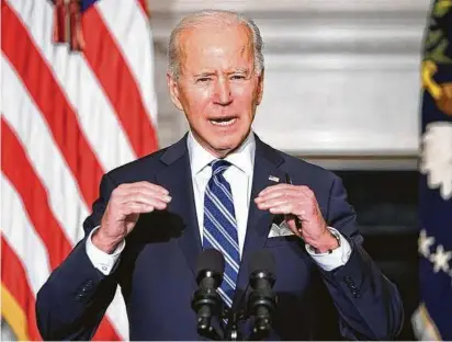  ?? Mandel Ngan / Tribune News Service ?? One of President Joe Biden’s climate proposals would be to establish a federal “carbon bank” that would commit to buying credits from farmers who employ sustainabl­e agricultur­al methods.