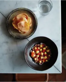  ??  ?? Above: scampi and prawn tartare with salt and vinegar chips. Above right, from left: co-owners Naomi Hart and Gregory Llewellyn with head chef Jarrod Walsh.