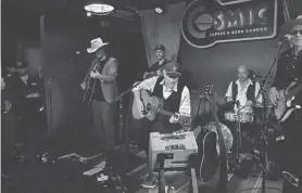  ?? SARA DIGGINS/AMERICAN-STATESMAN ?? Singer-songwriter Robert Earl Keen takes the stage to perform a free pop-up show at Cosmic Coffee + Beer Garden in South Austin in 2022.