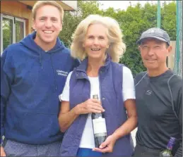  ??  ?? Senior coach Nick Wibberley with over-60s mixed doubles champions Elke Gardner and Brian Robinson