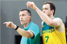  ?? — AFP photo ?? Australia’s head coach Andrej Lemanis (left) and Australia’s small forward Joe Ingles gesturing during their men’s semi-final basketball match against Serbia in Rio de Janeiro during the Rio Olympic Games in this Aug 19, 2016 file photo.