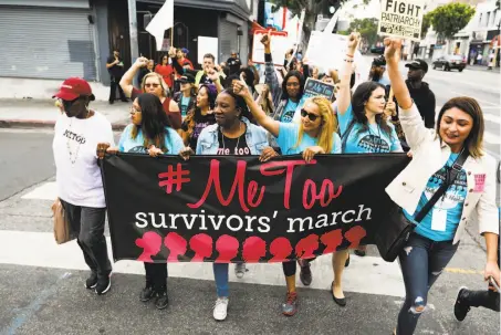  ?? Gary Coronado / Los Angeles Times / TNS ?? Sexual assault survivors and their supporters take part in a #MeToo Survivors March on Nov. 12 in Los Angeles.