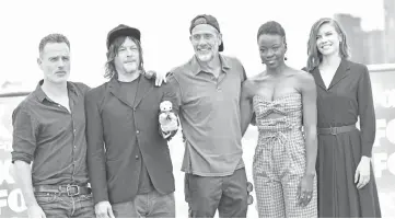  ??  ?? File photo taken on Friday shows (left to right) Andrew Lincoln, Norman Reedus, Jeffrey Dean Morgan, Danai Gurira and Lauren Cohan arrive for “The Walking Dead” photo call at Comic-Con Internatio­nal 2018 in San Diego, California. — AFP photos