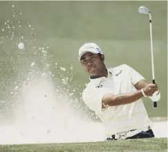  ??  ?? 0 Matsuyama plays out of a bunker during his final round