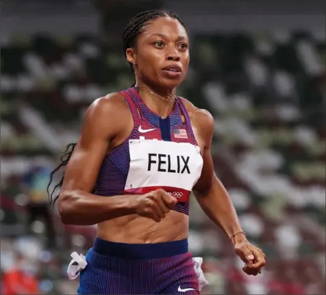  ?? Christian Petersen/Getty Images ?? Allyson Felix races for her 10th career medal.