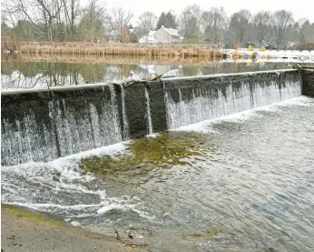  ?? APRIL GAMIZ/THE MORNING CALL ?? Repairs to Wehr’s Dam, shown Tuesday, have been completed. Efforts to save the dam, which was built in 1904, began a decade ago, with noted problems including fractures and missing chunks of concrete and water seepage under and through the structure.