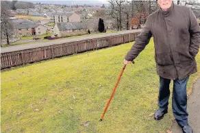  ??  ?? Action call Peter McGuire points to some of the dog waste