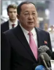 ?? PHOTO/RICHARD ?? North Korea’s Foreign Minister Ri Yong Ho speaks outside the U.N. Plaza Hotel, in New York on Monday. AP DREW